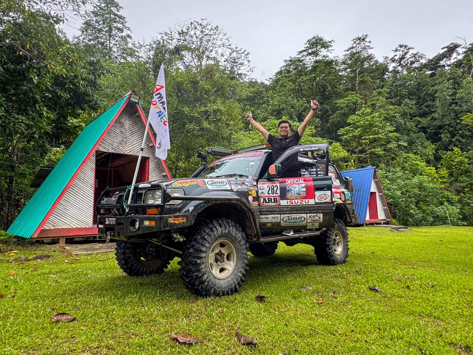 4x4 transfer vehicle on the gravel road into Danum Valley Conservation Area